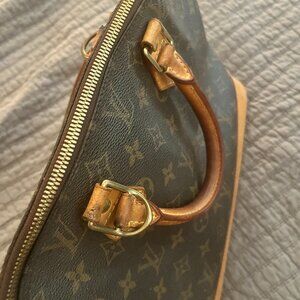 Louis Vuitton PM Alma handbag